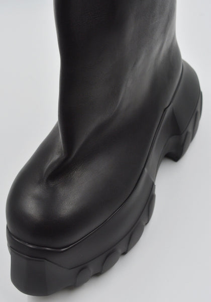 RICK OWENS MEN LEATHER FLARED MEGA TRACTOR BOOTS BLACK SS25 | DOSHABURI shop